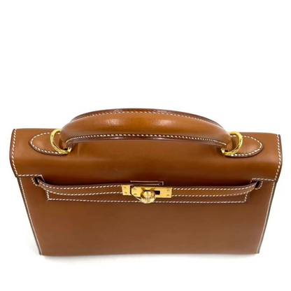 HERMES KELLY 25 | FAUVE SMOOTH BARENIA GHW
